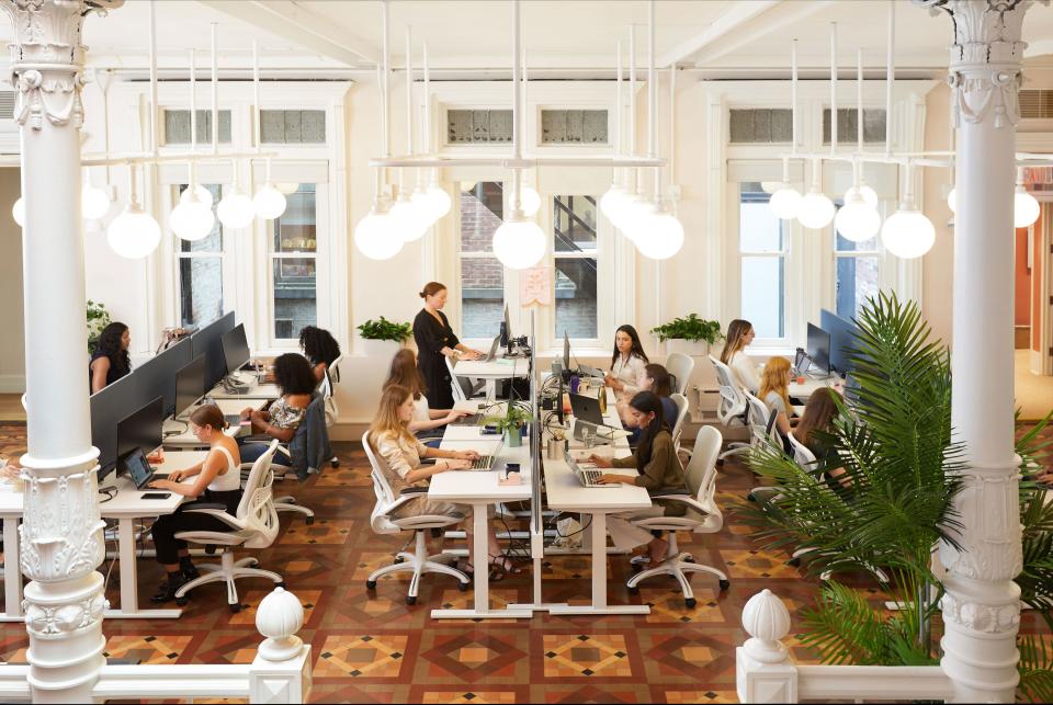 If there's one thing we always take note of in the Wing's spaces, it's the lighting. The grid of hanging orbs lends just the right amount of light to the open workspace below.