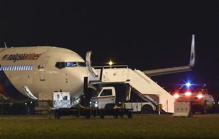 Malaysia Airlines flight MH192 from Kuala Lumpur to Bangalore is seen at Kuala Lumpur International Airport in Sepang outside Kuala Lumpur April 21, 2014. REUTERS/Samsul Said