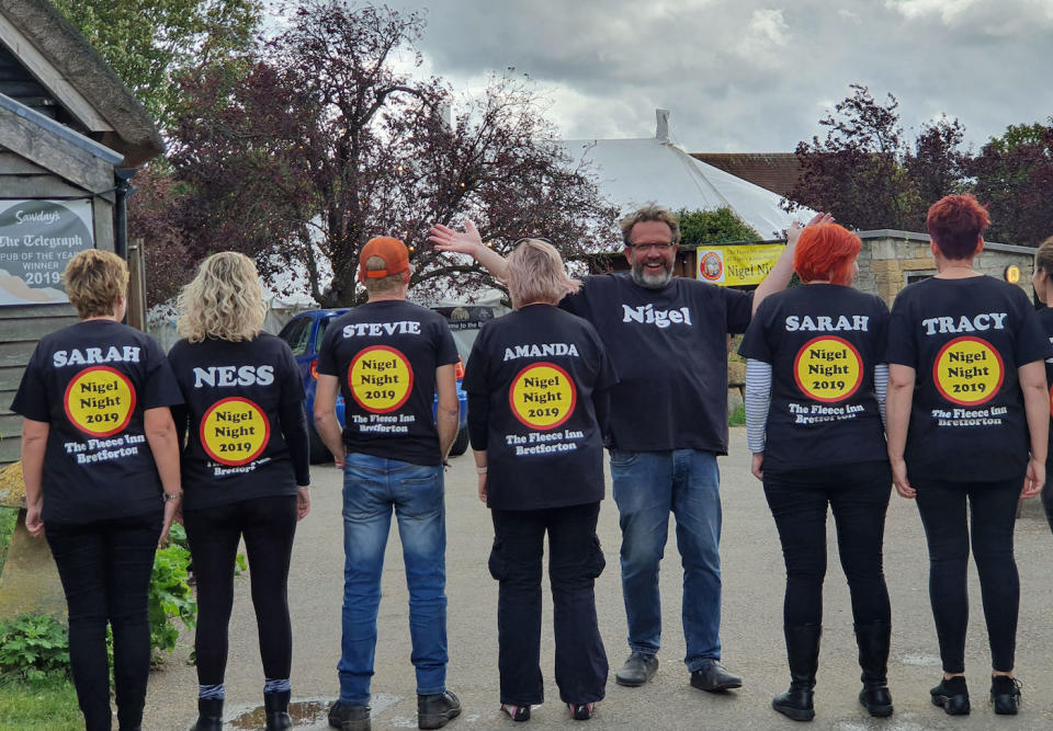 Landlord Nigel Smith, third from right, organised the Nigel celebration (Picture: PA)