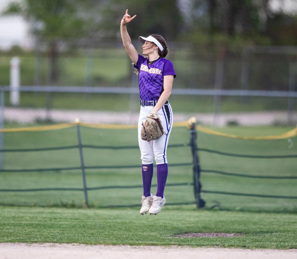 Hononegah's Brielle Sendele reacts towards her team on Friday, May 13, 2022, at Swanson Park in Roscoe.