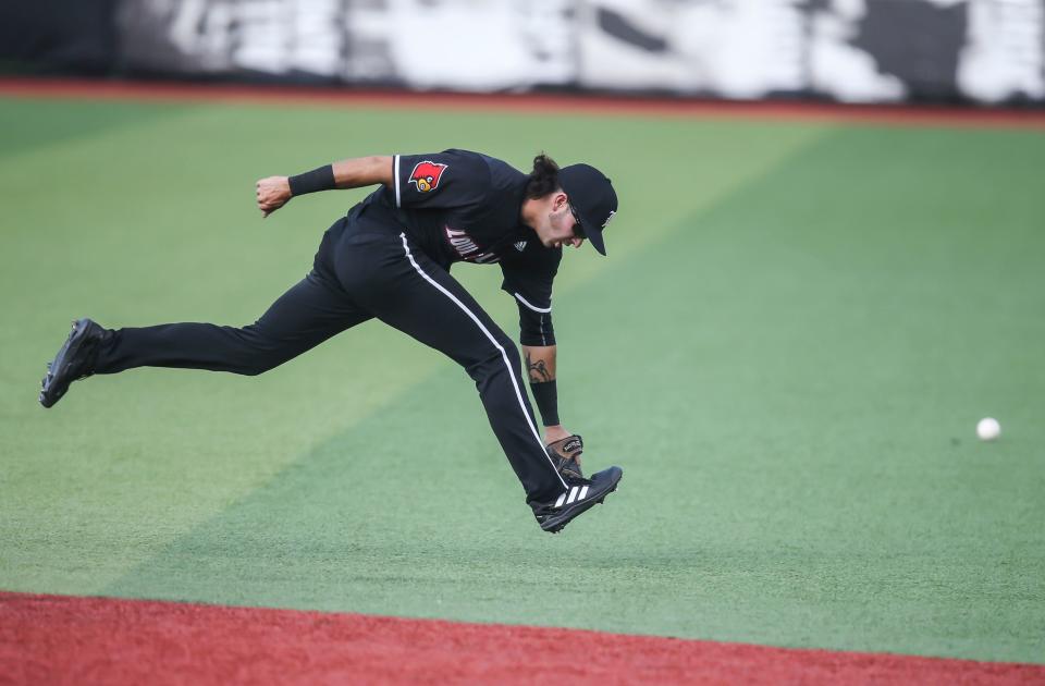 Louisville's Logan Beard can't make the stop to prevent the Wolverines from scoring at the 2022 NCAA Regional at Jim Patterson Stadium Saturday. June 4, 2022