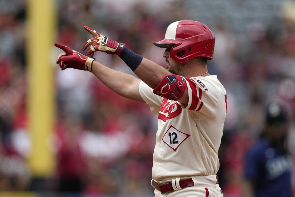 Los Angeles Angels' Matt Thaiss gestures after hitting an RBI double during the third inning of a baseball game against the Seattle Mariners Sunday, June 11, 2023, in Anaheim, Calif. (AP Photo/Mark J. Terrill)