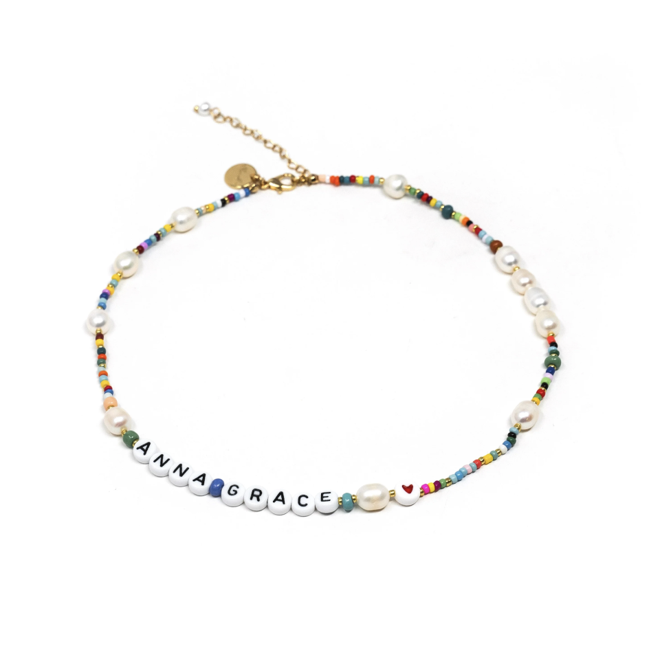 <p><a href="https://go.redirectingat.com?id=74968X1596630&url=https%3A%2F%2Fthesiskiss.com%2Fproducts%2Fcustom-rainbow-and-pearl-beaded-necklace&sref=https%3A%2F%2Fwww.countryliving.com%2Fshopping%2Fg32094034%2Fgraduation-gifts-for-her%2F" rel="nofollow noopener" target="_blank" data-ylk="slk:Shop Now;elm:context_link;itc:0;sec:content-canvas" class="link ">Shop Now</a></p><p>Beaded Name Necklace </p><p>thesiskiss.com</p><p>$38.00</p>