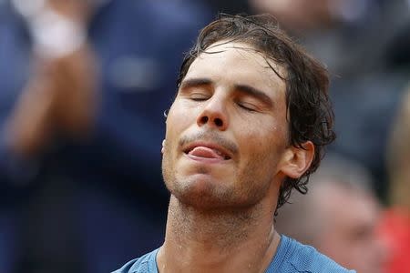 File Photo Tennis - French Open - Roland Garros - Rafael Nadal of Spain vs Facundo Bagnis of Argentina - Paris, France - 26/05/16. Nadal reacts. Nine-times French Open champion Nadal pulled out of the French Open May 27, 2016 because of a left wrist injury. REUTERS/Pascal Rossignol/File Photo