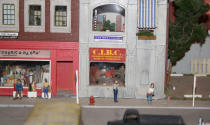 A sign indicates the Canadian Imperial Bank of Communists. After 67 years in the Liberty Village location, The Model Railroad Club of Toronto will be moving to make way for a condo.