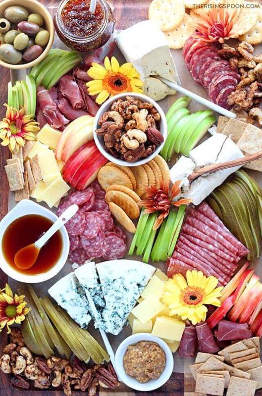 <p>The Rising Spoon</p><p>Need an easy and eye-catching appetizer for fall parties & holidays? Prep and assemble a simple charcuterie board (meat & cheese platter) with autumn-themed ingredients in about 30 minutes.</p><p><strong>Get the recipe: <a href="https://www.therisingspoon.com/2019/11/fall-charcuterie-and-cheese-board.html" rel="nofollow noopener" target="_blank" data-ylk="slk:Fall Charcuterie Board;elm:context_link;itc:0;sec:content-canvas" class="link rapid-noclick-resp">Fall Charcuterie Board</a></strong></p>