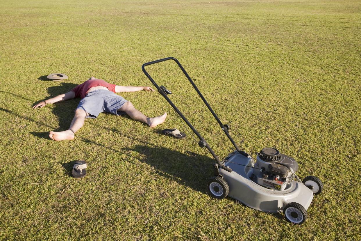 fainted man outside while mowing the grass