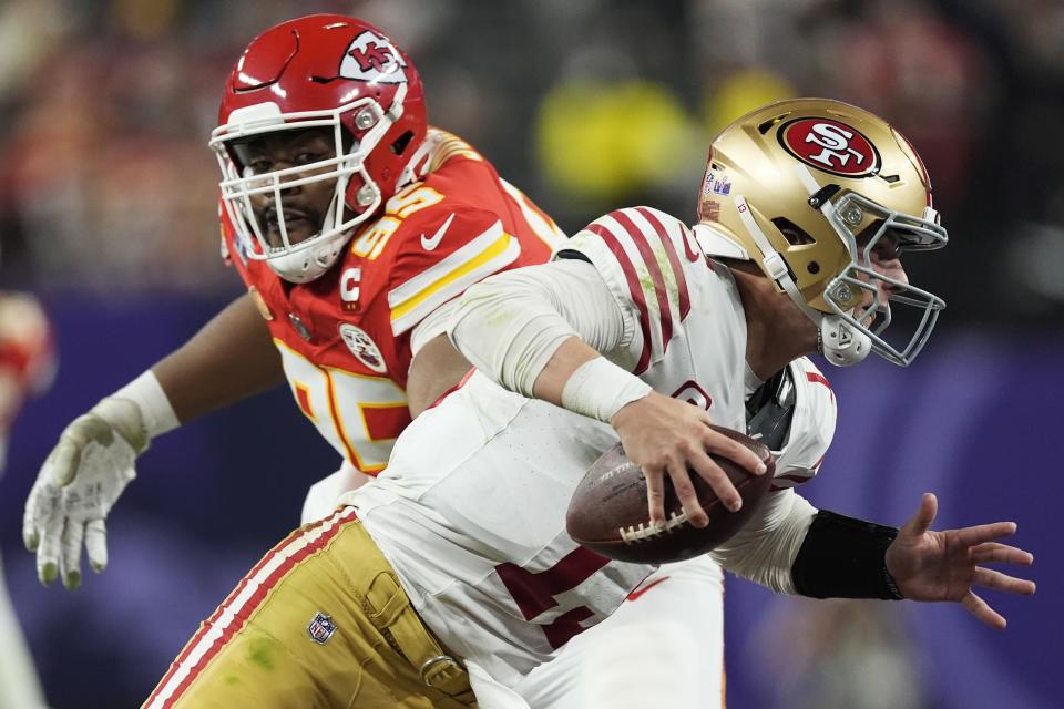 Kansas City Chiefs defensive tackle Chris Jones (95) chases San Francisco 49ers quarterback Brock Purdy (13) during the second half of the NFL Super Bowl 58 football game Sunday, Feb. 11, 2024, in Las Vegas. (AP Photo/George Walker IV)