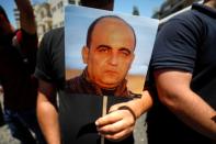 Protests after critic of Abbas died in Palestinian custody