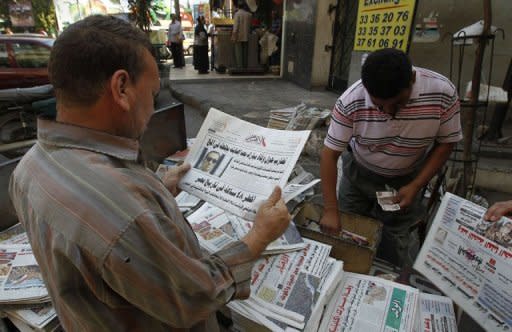 Egyptians read local newspapers headlining the health situation of ousted president Hosni Mubarak. Egypt's state television carried a ticker item saying Mubarak was in "a coma and is not clinically dead."