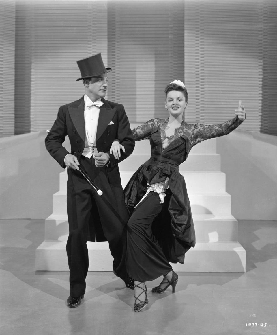 With Gene Kelly in a promotional photo for their 1950 film <em>Summer Stock</em>