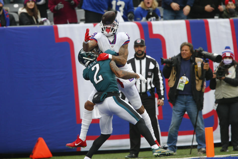 New York Giants' Kenny Golladay, right, fails to make a catch in the end zone while being covered by Philadelphia Eagles' Darius Slay during the first half of an NFL football game, Sunday, Nov. 28, 2021, in East Rutherford, N.J. (AP Photo/John Munson)