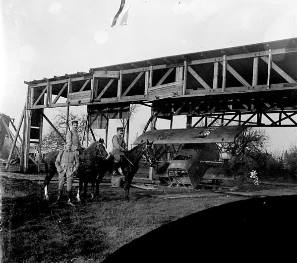 World War I soldiers on horseback with airplane remains (Photo courtesy of Anton Orlov)