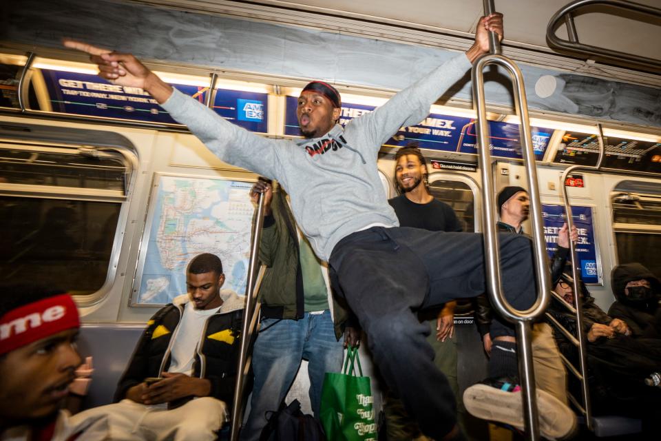 D-Astro performs on the New York City subway on Wednesday, November 16, 2022.