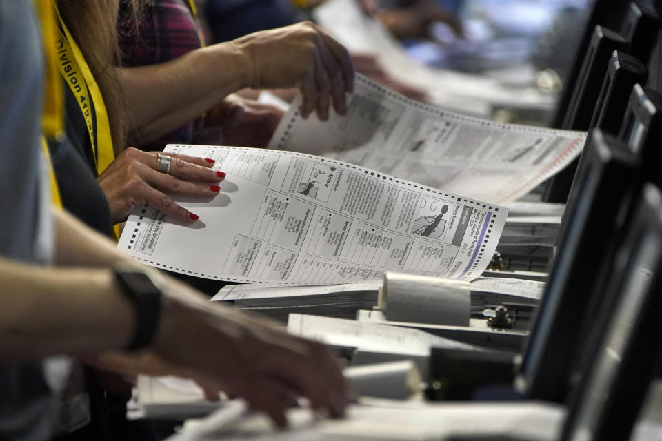 FILE - Election workers perform a recount of ballots from the recent Pennsylvania primary election at the Allegheny County Election Division warehouse on the Northside of Pittsburgh, June 1, 2022. The Supreme Court seems poised to take on a new elections case being pressed by Republicans that could increase the power of state lawmakers over races for Congress and the presidency, as well as redistricting, and cut state courts out of the equation. (AP Photo/Gene J. Puskar, File)