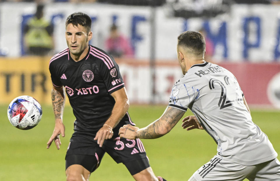 CF Montreal's Aaron Herrera, right, challenges Inter Miami's Franco Negri during second-half MLS soccer match action in Montreal, Saturday, May 27, 2023. (Graham Hughes/The Canadian Press via AP)