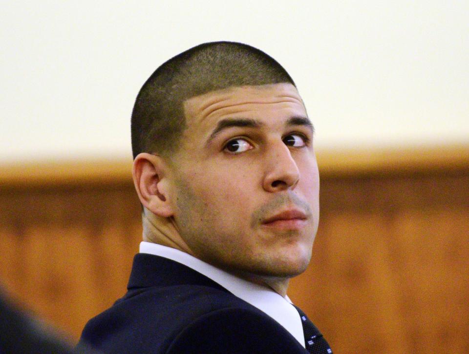 Former New England Patriots tight end Aaron Hernandez sits during his murder trial at Bristol County Superior Court in Fall River, Massachusetts, April 6, 2015. REUTERS/Ted Fitzgerald/Pool