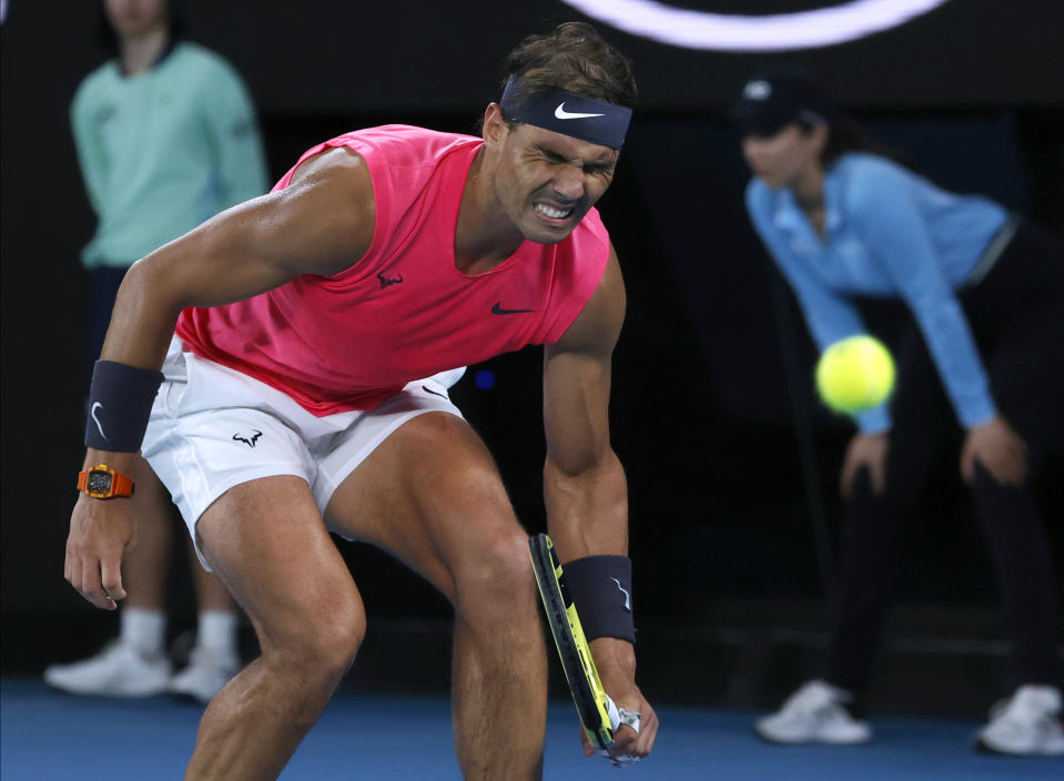 Spain's Rafael Nadal reacts during his quarterfinal match against Austria's Dominic Thiem at the Australian Open tennis championship in Melbourne, Australia, Wednesday, Jan. 29, 2020. (AP Photo/Andy Wong)