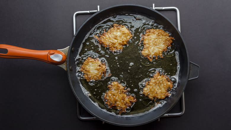 frying latkes in pan