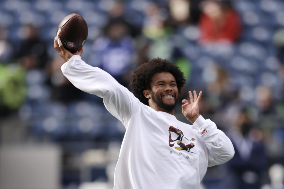 Arizona Cardinals quarterback Kyler Murray throws before an NFL football game against the Seattle Seahawks, Sunday, Nov. 21, 2021, in Seattle. (AP Photo/John Froschauer)