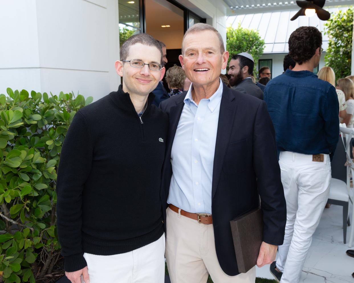 Ken Endelson (right) with his son, Zachary, hosted a cocktail reception April 17 to benefit Project Connect, a program started by Palm Beach Synagogue that is dedicated to individuals with special needs.