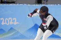 Erin Jackson of the United States reacts after her heat in the speedskating women's 500-meter race at the 2022 Winter Olympics, Sunday, Feb. 13, 2022, in Beijing. (AP Photo/Sue Ogrocki)