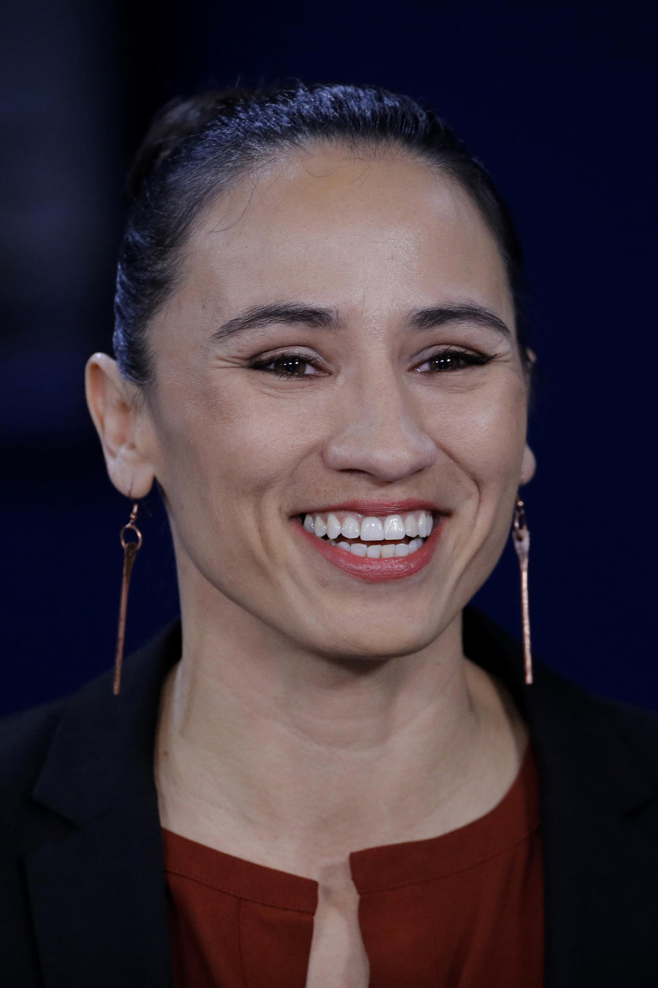 FILE - In this Oct. 30, 2018, file photo, Democratic challenger Sharice Davids talks during a Kansas' 3rd Congressional District debate against Incumbent Republican U.S. Rep. Kevin Yoder Tuesday, Oct. 30, 2018, in Kansas City, Mo. More than 100 Native Americans are seeking seats in Congress, governor's offices, state legislatures and other posts across the country in what political observers say has been a record number of candidates. Congressional races in New Mexico and Kansas could determine whether Congress has its first Native American representative. (AP Photo/Charlie Riedel, File)