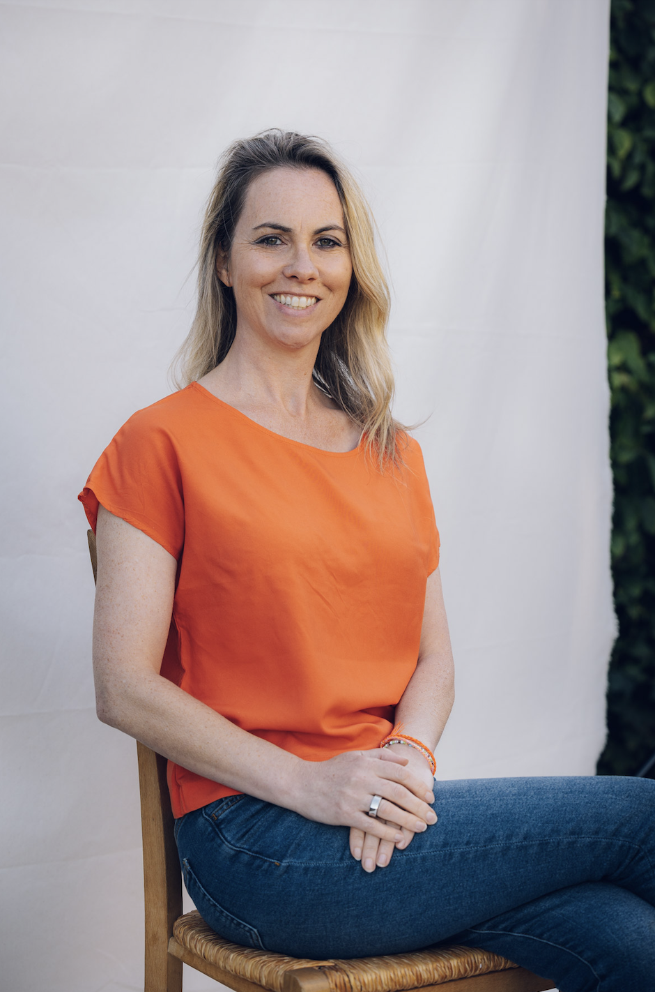 a woman sitting on a chair