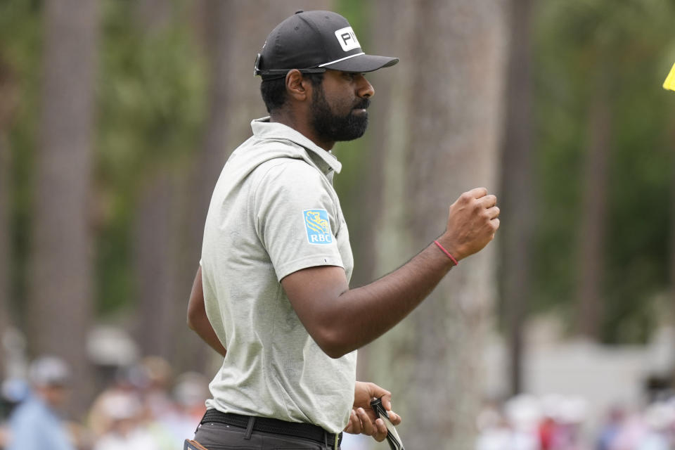 Sahith Theegala celebrates after a birdie on the ninth hole during the final round of the RBC Heritage golf tournament, Sunday, April 21, 2024, in Hilton Head Island, S.C. (AP Photo/Chris Carlson)