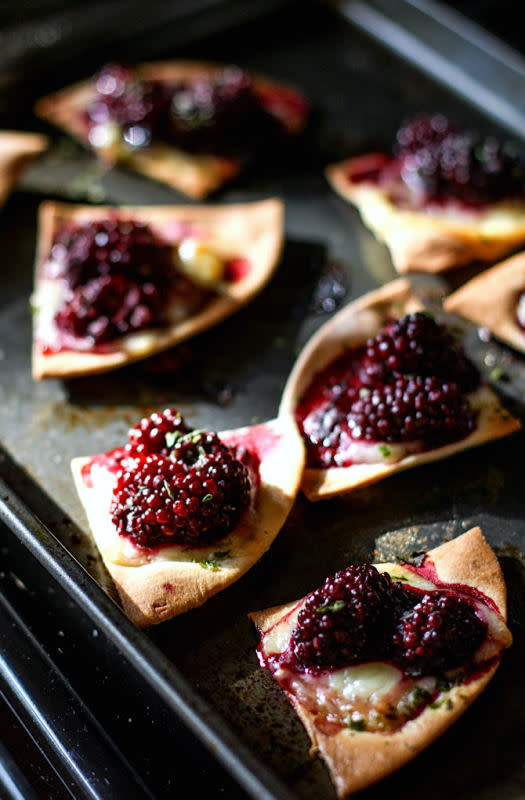 <p>Cotter Crunch</p><p>Gluten-free Blackberry Basil Nachos are amazingly delicious, protein-packed, kid-friendly, healthy and ready in 20 minutes or less. </p><p><strong>Get the recipe: <a href="https://www.cottercrunch.com/gluten-free-blackberry-basil-nachos-vegetarian/" rel="nofollow noopener" target="_blank" data-ylk="slk:Blackberry Nachos;elm:context_link;itc:0;sec:content-canvas" class="link rapid-noclick-resp">Blackberry Nachos</a></strong></p>
