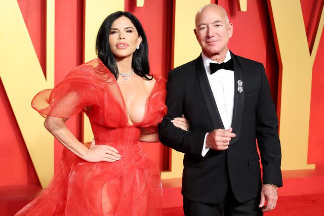 <p>Daniele Venturelli/Getty </p> Lauren Sánchez and Jeff Bezos attends the 2024 Vanity Fair Oscar Party