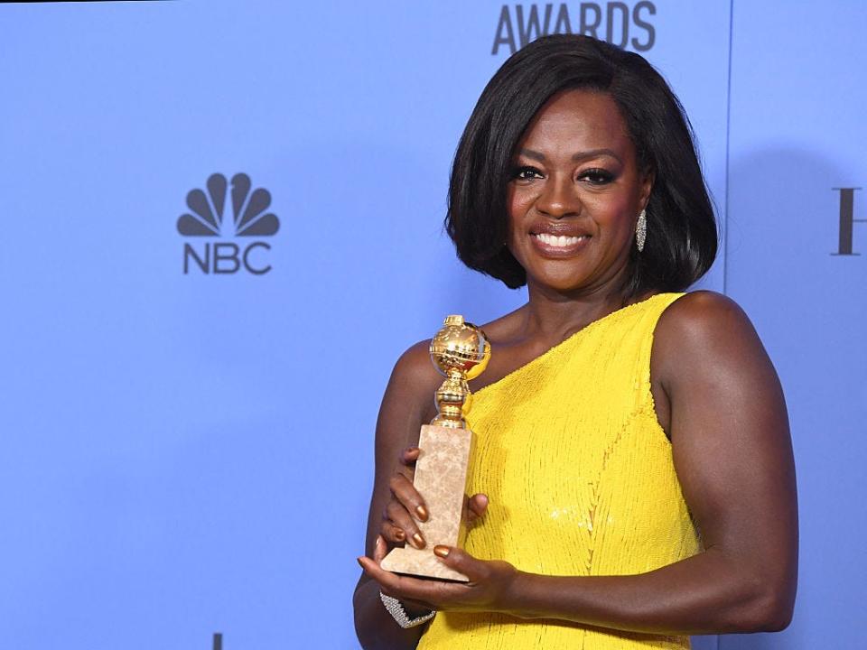 Viola Davis holds a Tony award