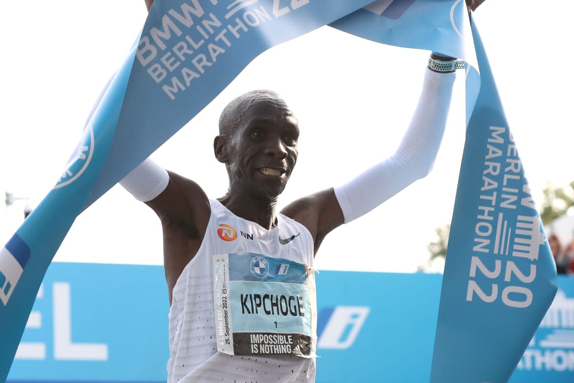 BERLIN, GERMANY – SEPTEMBER 25: Eliud Kipchoge of Kenya celebrates winning the 2022 BMW Berlin-Marathon in a new Word Record Time of 2:01:09 h on September 25, 2022 in Berlin, Germany. (Photo by Alexander Hassenstein/Getty Images)