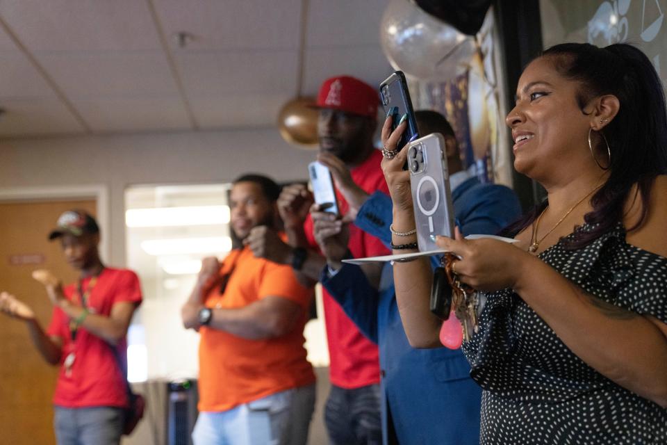 Aug 31, 2023; Paterson, NJ, USA; Liza Chowdhury, Project Director of the hospital-based violence intervention program the Paterson Healing Collective, looks on during a graduation celebration for the Safe Summer Teen Club. The Paterson Healing Collective’s Safe Summer Teen Club began in July as a way to keep young people from different sections of Paterson engaged and to provide them with skills they can utilize during the school year, according to Chowdhury. Mandatory Credit: Michael Karas-The Record