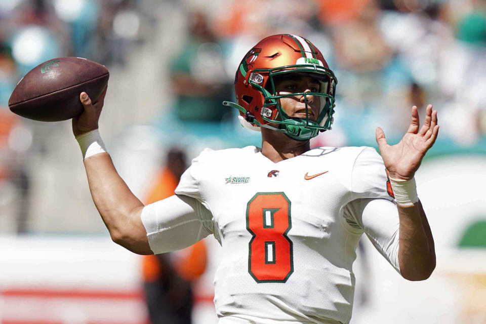 FILE - Florida A&M quarterback Jeremy Moussa (8) stands back to pass during the first half of the Orange Blossom Classic NCAA college football game against Florida A&M, Sunday, Sept. 4, 2022, in Miami Gardens, Fla. The heir apparent to ex-Jackson State star Shedeur Sanders as the league's top passer. Moussa passed for 2,732 yards and 21 touchdowns with 10 interceptions last season. He's the preseason first-team All-SWAC QB. (AP Photo/Lynne Sladky, File)