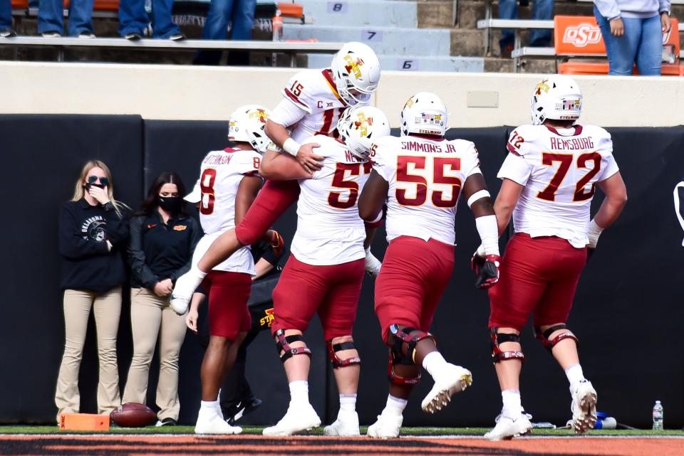 Iowa State quarterback Brock Purdy (15) celebrates with  teammates after scoring a touchdown at Oklahoma State, Saturday, Oct. 24, 2020, in Stillwater.