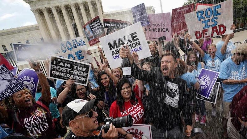 Anti-abortion advocates celebrate outside the Supreme Court in Washington on June 24, 2022.