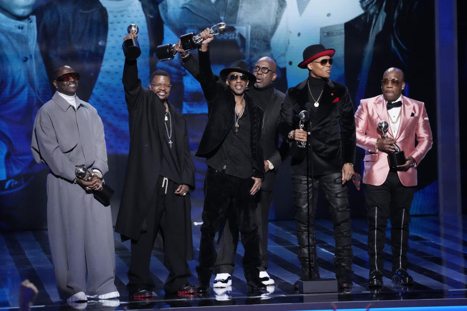 From left, Johnny Gill, Ricky Bell, Ralph Tresvant, Bobby Brown, Ronnie DeVoe and Michael Bivins of New Edition accept the Hall of Fame award during the 55th NAACP Image Awards, Saturday, March 16, 2024, at The Shrine Auditorium in Los Angeles. (AP Photo/Chris Pizzello)