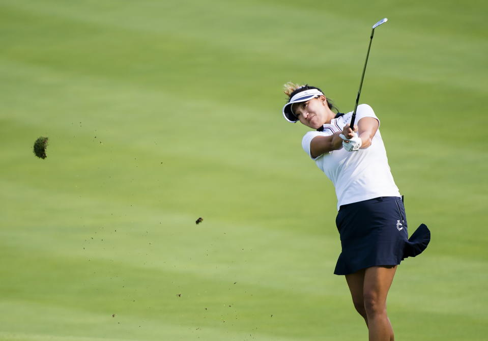 Annie Park, of the United States, hits her approach shot on the 15th hole during the first round of the CP Women's Open golf tournament in Aurora, Ontario, Thursday, Aug. 22, 2019. (Nathan Denette/The Canadian Press via AP)
