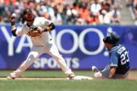 Jun 24, 2018; San Francisco, CA, USA; San Francisco Giants infielder Brandon Crawford (35) forces an out at second during the fourth inning against the San Diego Padres at AT&T Park. Mandatory Credit: Kiel Maddox-USA TODAY Sports