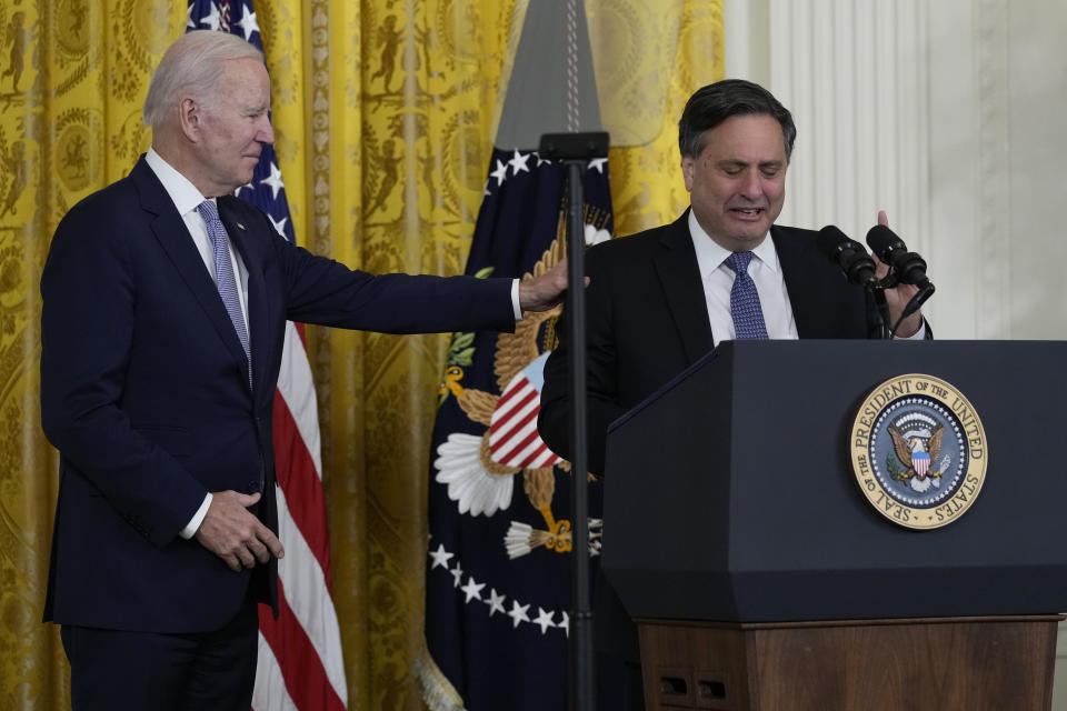 President Joe Biden attends an event to thank outgoing White House chief of staff Ron Klain, right, in the East Room of the White House in Washington, Wednesday, Feb. 1, 2023. (AP Photo/Susan Walsh)