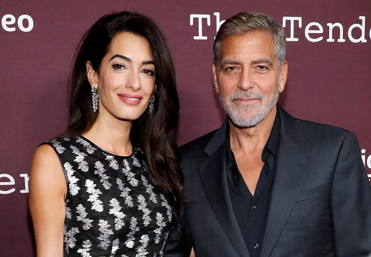 George Clooney says media outlets are endangering the lives of his and Amal Clooney's children by posting photos of their faces. 