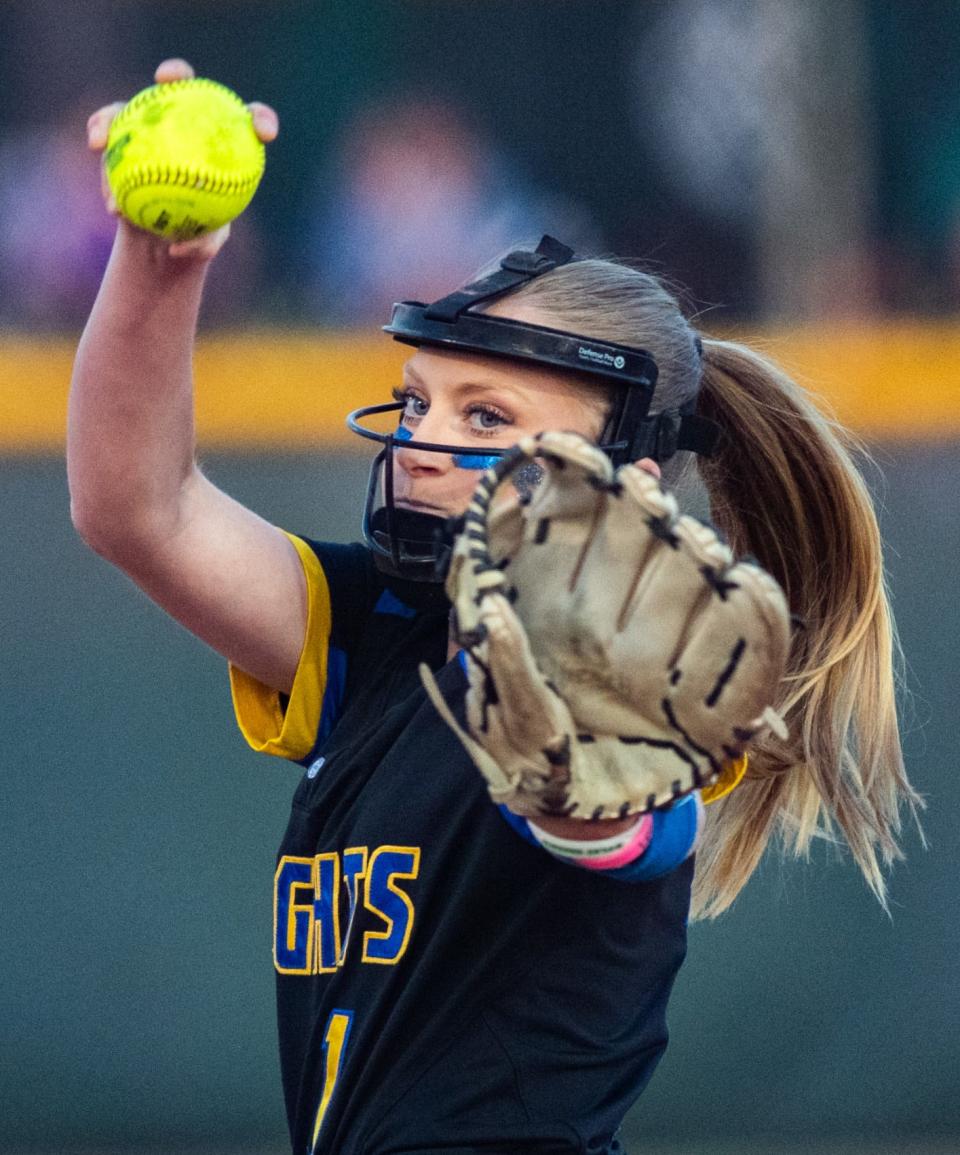 Castle’s Gigi Lynch (1) pitches against the North Huskies in the 4A sectional championship at North High School, Saturday night, May 28, 2023.