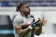 Linebacker Ifeanyi Augustine Nwoye, of Nigeria, takes part in the NFL International Combine at the Tottenham Hotspur Stadium in London, Tuesday, Oct. 4, 2022. International athletes on Tuesday are taking part in a series of tests in front of NFL evaluators for a potential position in the NFL's International Player Pathway programme. (AP Photo/Kin Cheung)