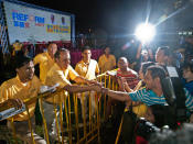 Kenneth Jeyaretnam shakes the hands of those who wish him luck in the four-corner by-election. (Yahoo! photo/Alvin Ho)