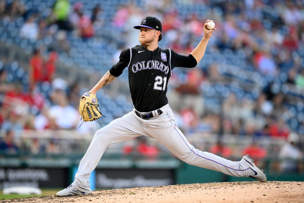 ROCKIES-NACIONALES (AP)