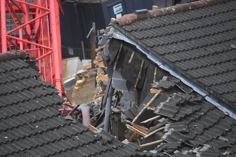 View of the damage caused in Bow, east London, where a 20-metre crane has collapsed on to a house leaving people trapped inside.