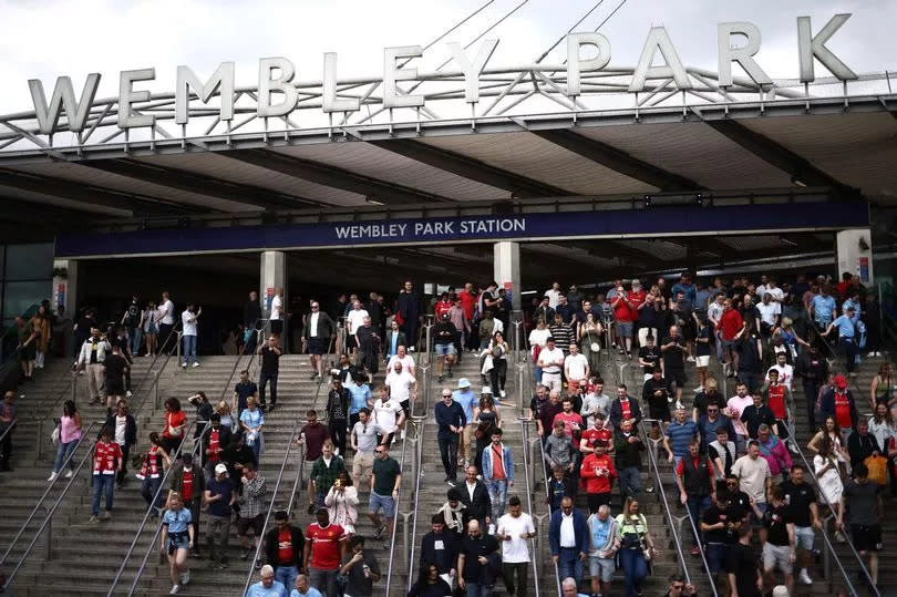 Fans arrive at Wembley Park station on their way to Wembley Stadium in London