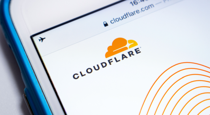 The logo of Cloudflare, (NET) an US web infrastructure & security company, its website on iOS.