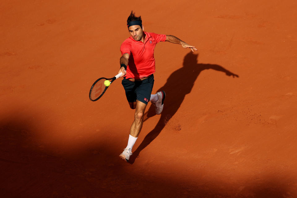 Roger Federer of Switzerland plays a forehand during his men's second round match against Marin Cilic of Croatia during day five of the 2021 French Open at Roland Garros on June 03, 2021 in Paris, France. / Credit: Clive Brunskill / Getty Images